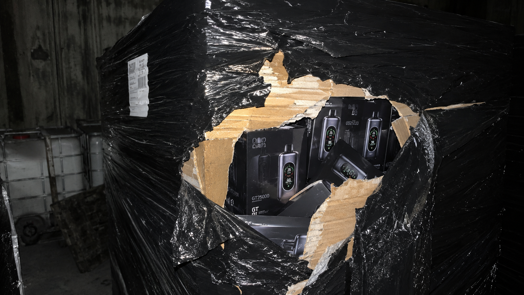 Underground warehouse pallet wrapped in black shrink wrap containing off-grid detachable pod systems